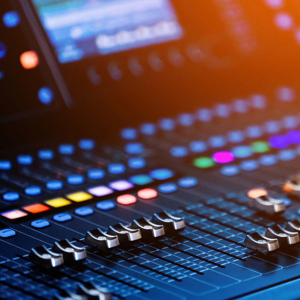 Concert sound mixer panel with volume regulators. Professional audio and light equipment for sound recording studio, live music broadcasting, television, party. mixing console. audio signals.